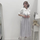 ビッグリボンビジュープリーツスカート